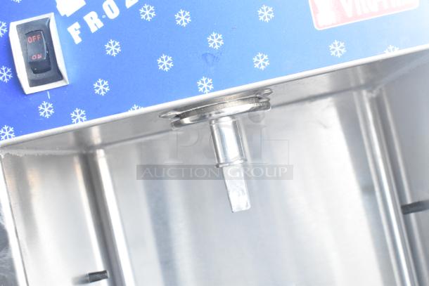 Vita-Mix VM0800A commercial frozen drink mixer, blue panel with snowflake design, on/off switch, stainless steel components.