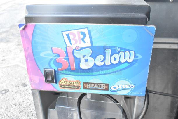 Vita-Mix VM0800A commercial frozen drink mixer with colorful branding. Features 120 volts and 1 phase. Visible labels include Reese's, Heath, and Oreo.