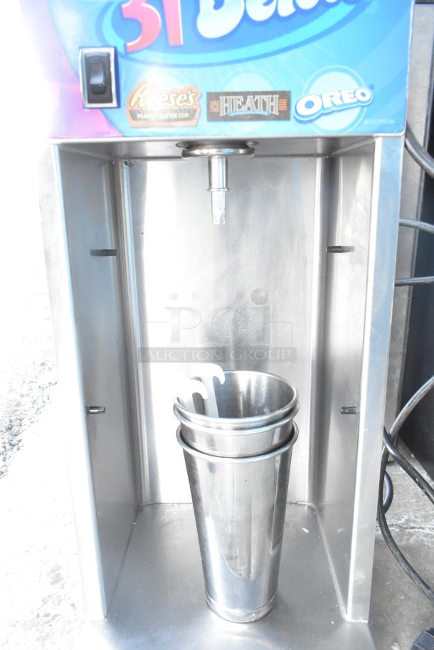 Vita-Mix VM0800A commercial frozen drink mixer, 120V, featuring stainless steel blending cup and branding, gently used condition.