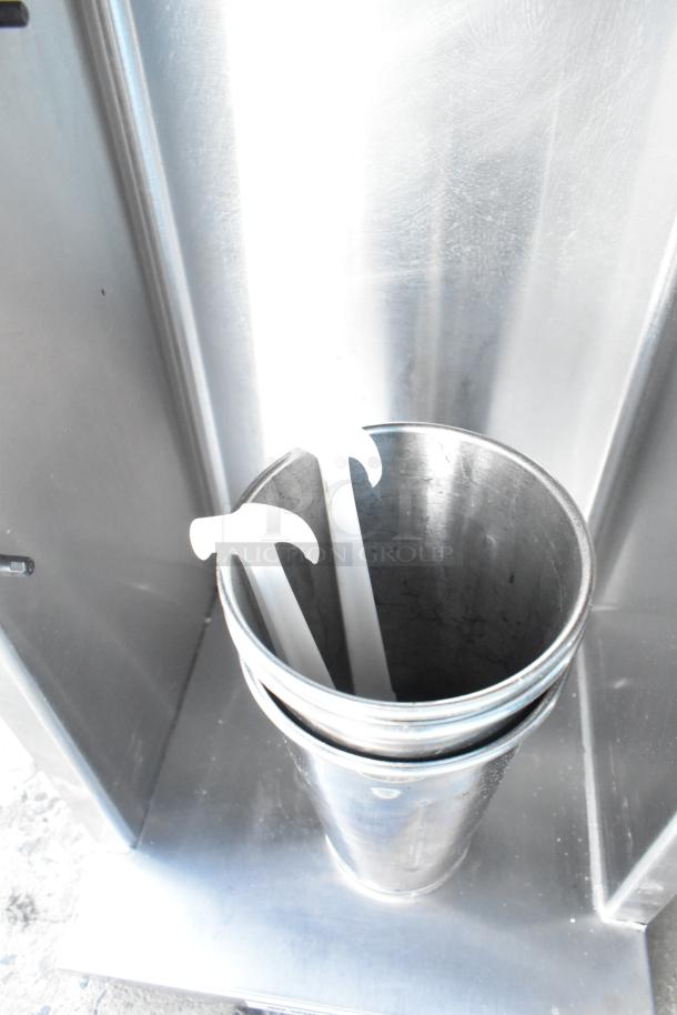 Vita-Mix VM0800A frozen drink mixer, stainless steel, 120 volts, commercial-grade, visible container and stirring paddles.