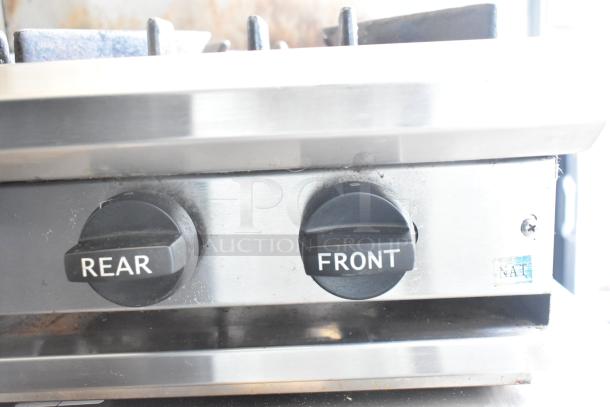 BT60-4N Commercial Gas Range controls, showing rear and front burner knobs and NAT gas label.