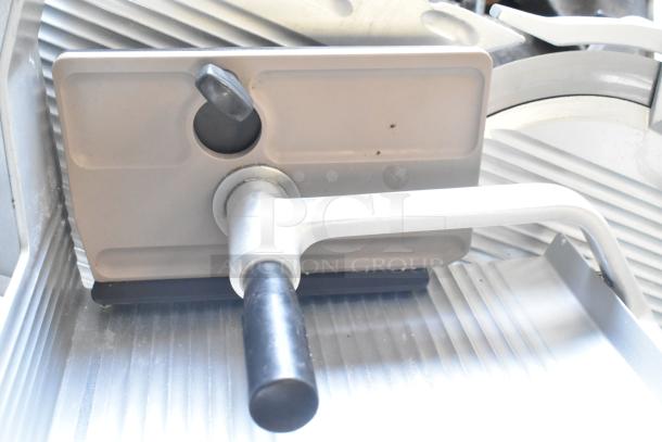 Bizerba SE 12 US commercial meat slicer, with integrated blade sharpener, 120 volts, 1 phase, excellent condition.