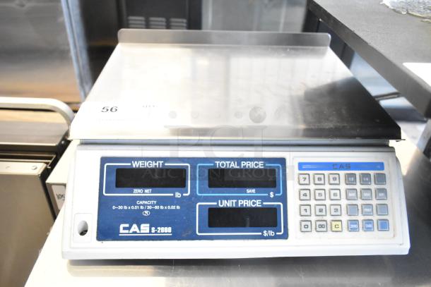 CAS S-2000 countertop scale with 30 lb capacity, featuring weight, total, and unit price displays, in used condition.