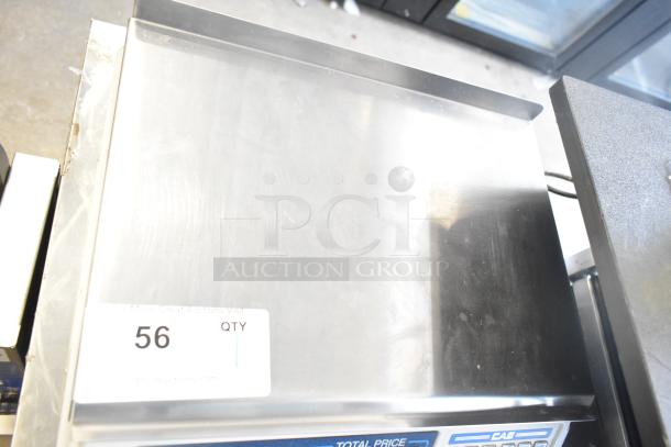 CAS S-2000 countertop scale, 30 lb capacity, stainless steel platform, slight wear, clear display, item label showing QTY 1.