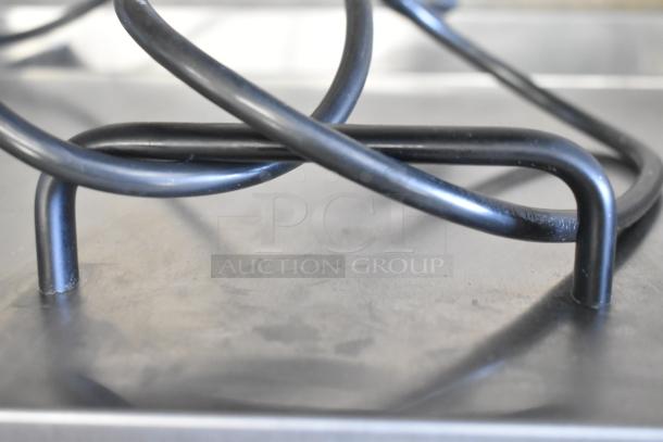 Prince Castle 297-T12P countertop bun toaster, 115 volts, 1 phase. Visible heating element detail, indicates robust build.