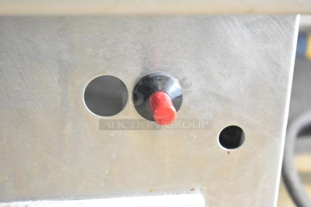 Garland Commercial Countertop Flat Top Griddle with metal surface and red control knob, in good condition.