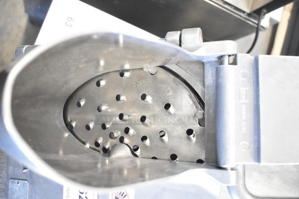 Alfa Pelican Head with grating blade, stainless steel, visible wear, model and brand engraved, essential for food processing.