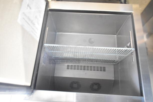 Dukers DUC29F commercial undercounter freezer, single door, on casters, 115V, 1 Phase; good condition, interior view.