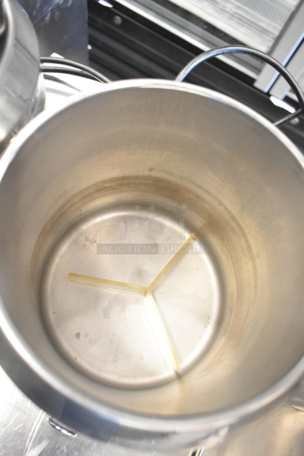 Interior view of a stainless steel Server FSP Commercial Countertop Topping Warmer, showing a clean and spacious interior.