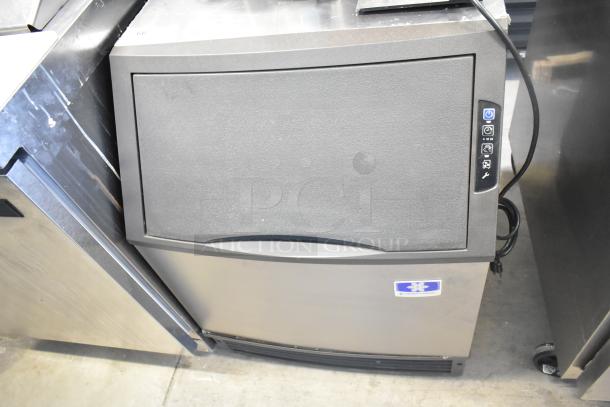 Manitowoc UYF0140A-161B undercounter ice machine, 115V, excellent condition, digital controls, half dice cube production.
