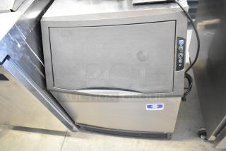 Manitowoc UYF0140A-161B undercounter ice machine, 115V, excellent condition, digital controls, half dice cube production.