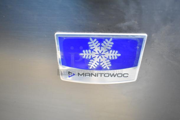 Manitowoc ice machine logo with snowflake design, model UYF0140A-161B.