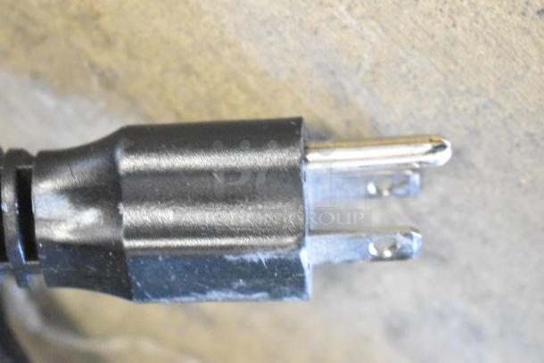 Close-up of a power plug for the Manitowoc UYF0140A-161B ice machine, 115 volts, single phase.