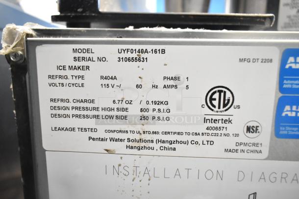 Manitowoc UYF0140A-161B ice machine label showing model, serial number, refrigerant type, voltage, and certifications.