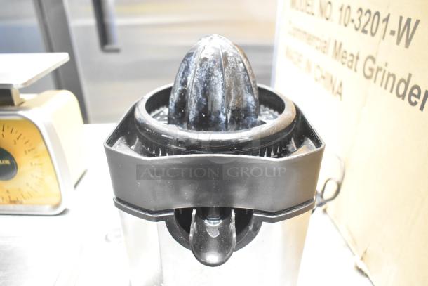 3 items: Qualite digital scale, Taylor scale, Cuisinart juicer base. Each item with visible signs of wear.