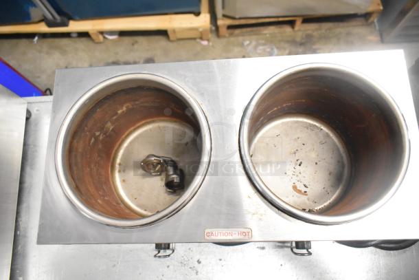 Server TWIN FS countertop food warmer with two wells and pump, 120 volts, 1 phase. Shows caution label. Good condition.