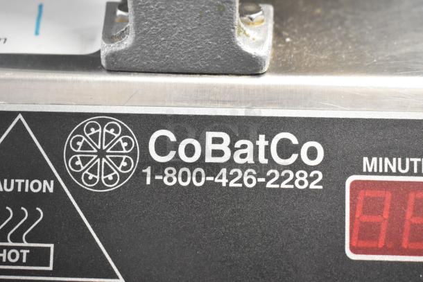 CoBatCo countertop waffle cone maker, 120 volts, 1 phase. Visible caution symbol and contact number 1-800-426-2282.