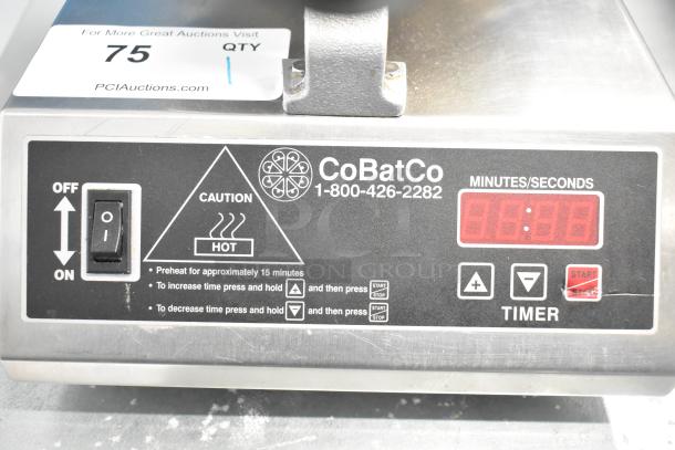 CoBatCo countertop waffle cone maker, 120 volts, 1 phase. Features control panel with timer. Clearly marked caution and operation instructions.