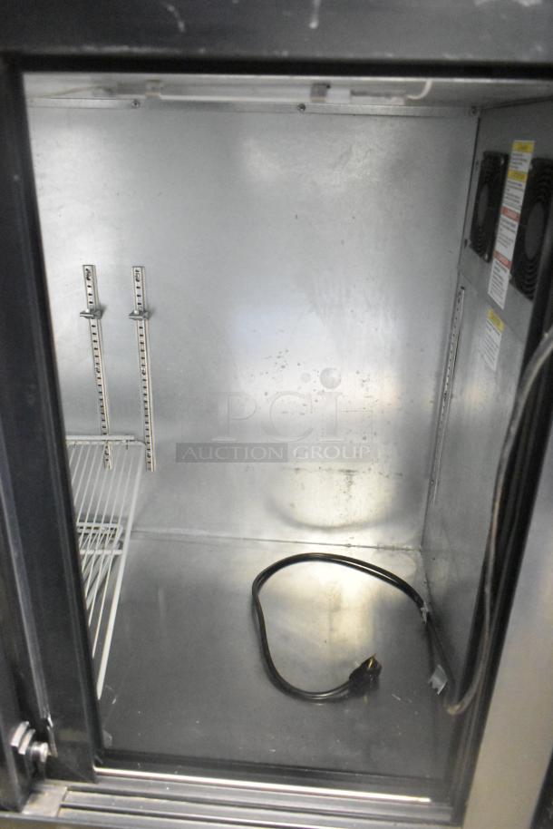 Beverage Air BB72HC-1-GS-B 3 Door Back Bar Cooler, interior view, 115 volts, 1 phase, glass shelving, power cord visible.