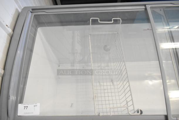 SD-575 Commercial Novelty Ice Cream Freezer Merchandiser with sliding glass lid, model SD-575, 115 volts, 1 phase.
