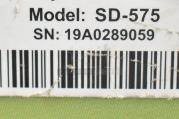 SD-575 Commercial Novelty Ice Cream Freezer label with model SD-575 and serial number 19A0289059 visible.