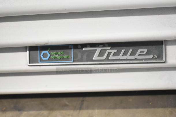 2021 True TSCI-600R-G-PH commercial cooler, single door, with "natural refrigerant" label, 115 volts.