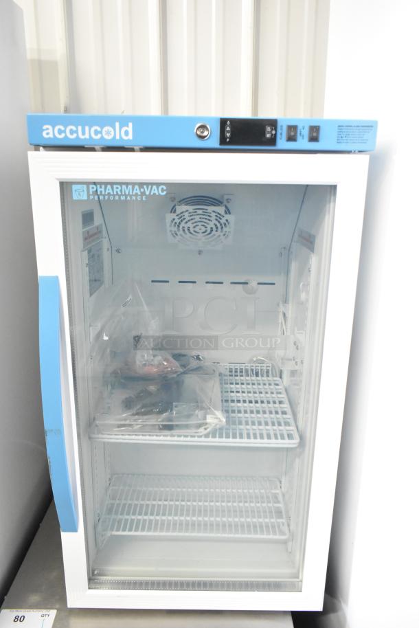 Accucold ARG3PV456 commercial mini cooler. 115V, 1 Phase. Features clear door, two shelves, Pharma-Vac branding.