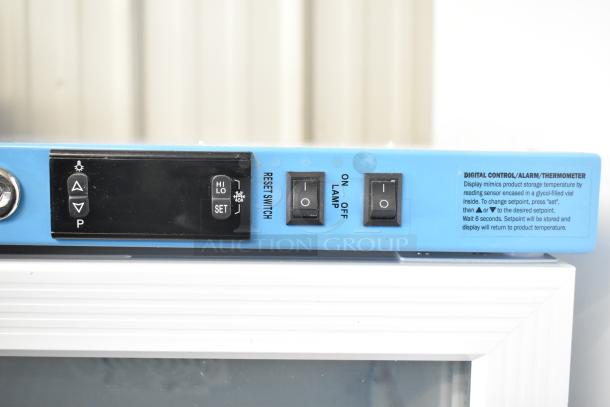 Accucold ARG3PV456 Commercial Mini Cooler control panel with digital display, switches, and temperature settings.