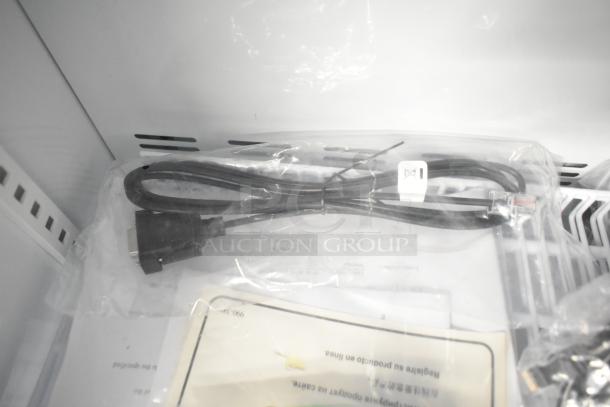 Accucold ARG3PV456 Commercial Mini Cooler power cord and documents in packaging, 115 Volts, 1 Phase.