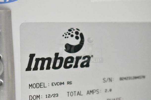 Imbera EVC04 Commercial Mini Cooler Merchandiser label, showing model, serial number, voltage, and amps information.