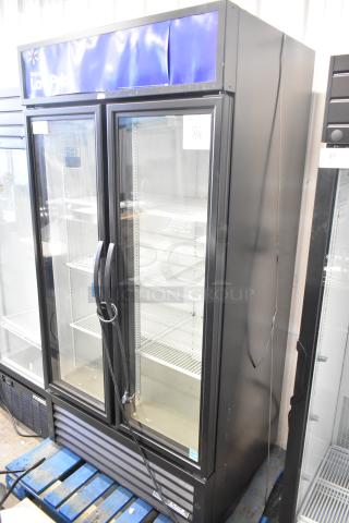 2024 True GDM-35-HC Commercial 2 Door Reach In Cooler Merchandiser, black, 115V, with shelves, good condition.