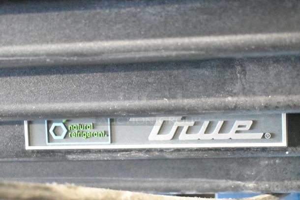 2024 True GDM-35-HC 2 Door Reach In Cooler label, featuring "True" logo and "natural refrigerant" marking.