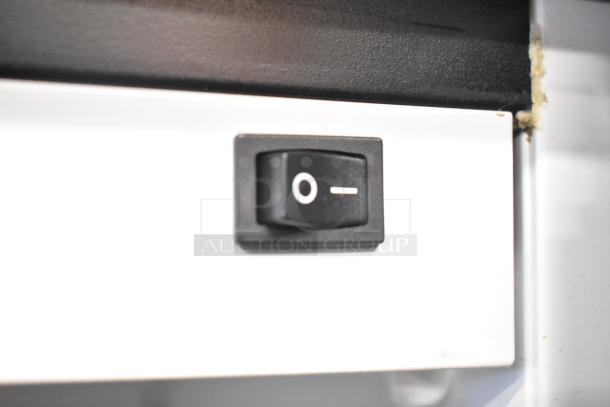 2019 Habco SE18 commercial cooler switch detail showing on/off positions on black and white control panel.