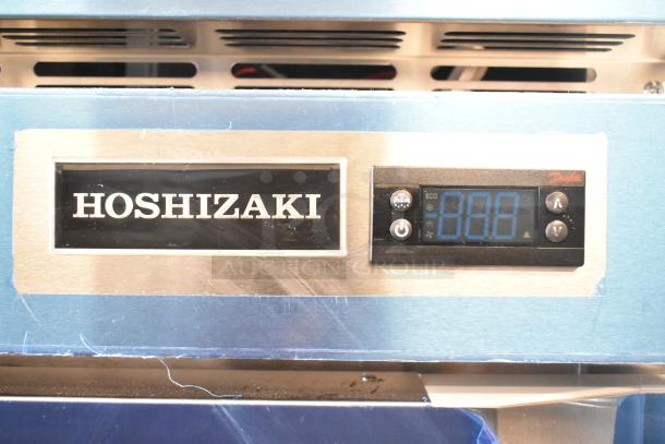 Brand new 2026 Hoshizaki R1A-FSL commercial single-door cooler, digital display, labeled "Hoshizaki," 115V, 1 phase.