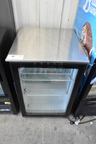 Imbera EVC04 Commercial Mini Cooler Merchandiser, 115 Volts, 1 Phase, glass door, interior shelves, model tag visible.