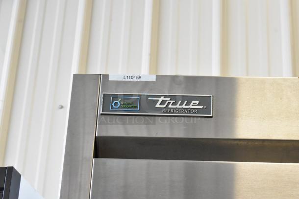 2021 True T-35-HC Commercial 2 Door Reach In Cooler, visible True logo, 115 Volts, 1 Phase, stainless steel finish.