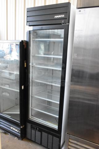 2019 Habco SE18 commercial single door cooler. Features clear glass door, five wire shelves, and Habco branding. 115V, 1 phase.