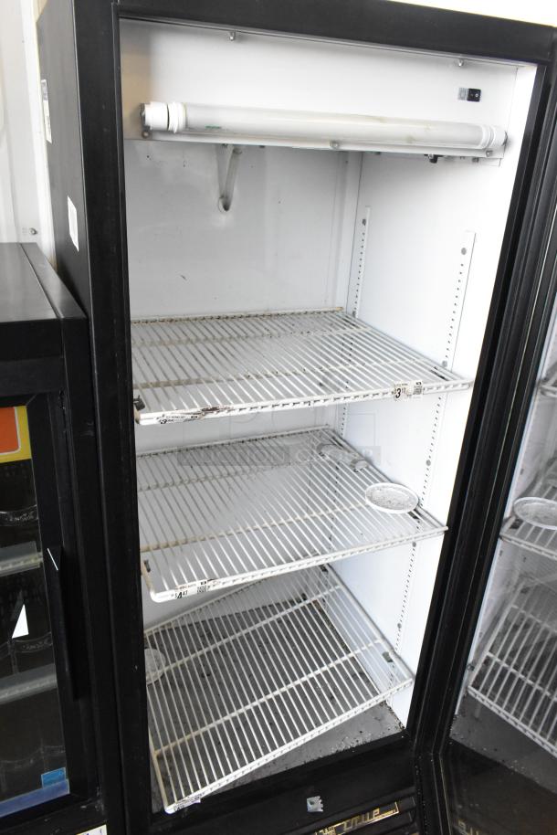 True GDM-12-HC-LD commercial cooler merchandiser, single door, with shelves and internal fluorescent light, used condition.