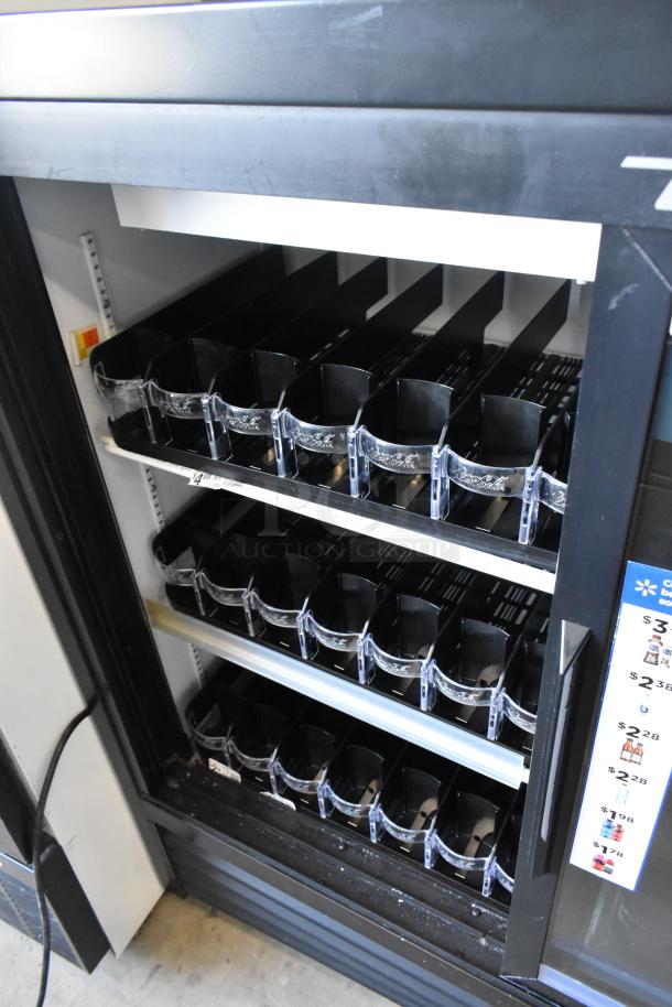 2019 True GDM-41SL-48-HC-LD 2 Door Cooler, 115V, shelves with dividers, clean interior, clear glass Coca-Cola panels.