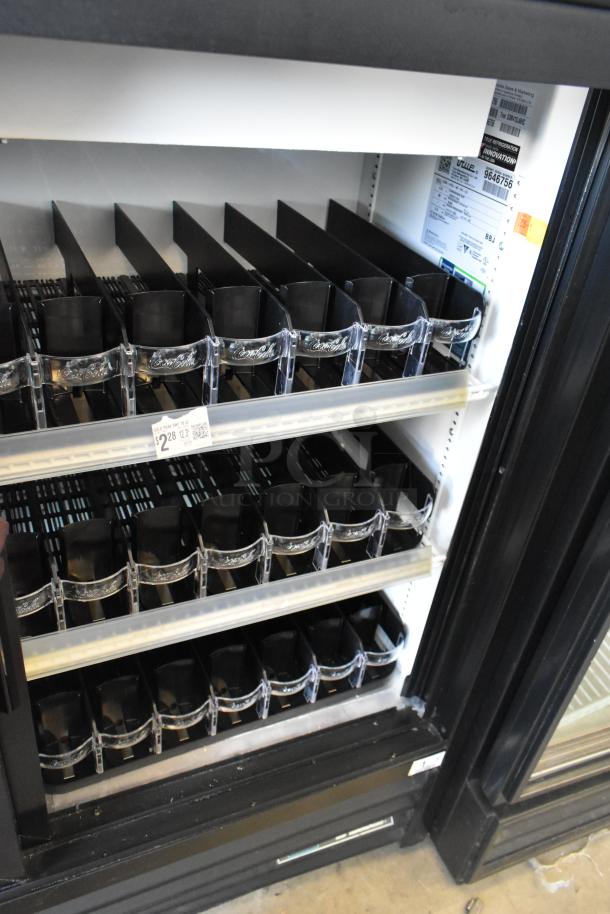 2019 True GDM-41SL-48-HC-LD cooler merchandiser, 2 doors, 115V, 1 phase, internal shelves, clear signage, model label visible.