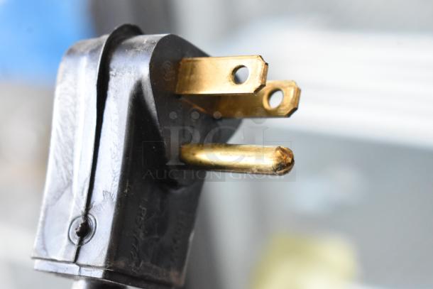 Close-up of a 115-volt plug for the 2019 Habco SE18 Commercial Single Door Reach In Cooler Merchandiser.