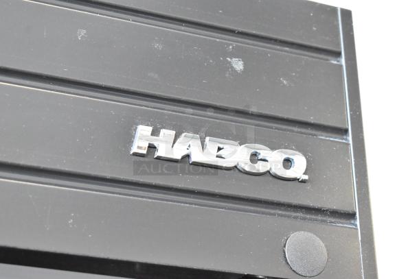 2019 Habco SE18 Commercial Cooler, single door. Visible Habco logo, 115 volts, 1 phase. Black exterior, minor wear.