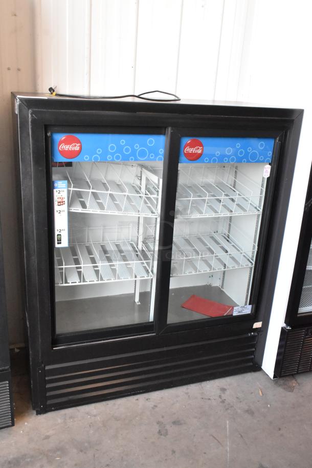 Imbera VRD41 commercial two-door reach-in cooler merchandiser, 115V, Coca-Cola branding, glass doors, wire shelving.
