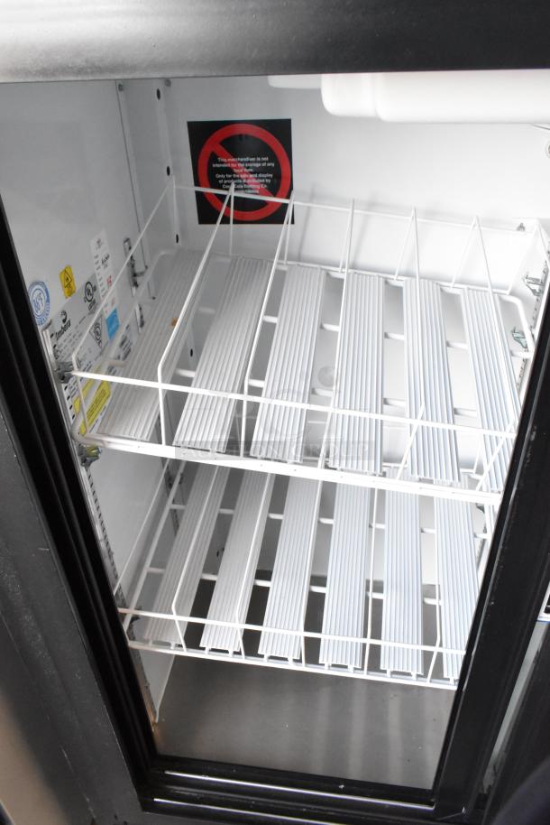 Imbera VRD41 Commercial 2 Door Reach In Cooler, 115 Volts, 1 Phase, white wire shelving, tags indicating usage restrictions.