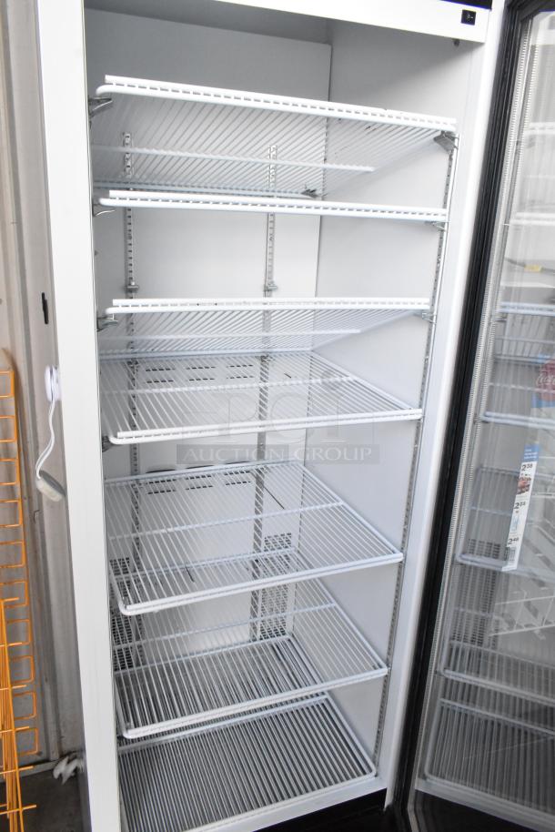 2019 Habco SE18 commercial single door reach-in cooler with adjustable wire shelves, 115 volts, 1 phase, excellent condition.