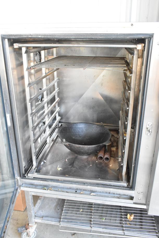 Blodgett BCM 2.10 commercial combi convection oven, natural gas, on casters, 92,000 BTU, stainless steel interior.