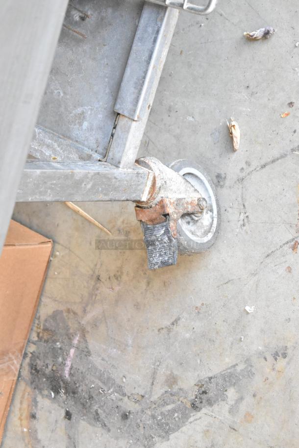 Blodgett BCM 2.10 commercial convection oven on casters, 92,000 BTU. Visible caster wheel, moderate wear, natural gas powered.