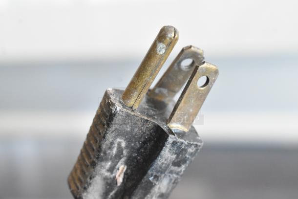 Close-up of a metal plug for the Hatco GRHW-42 Warming Station; shows signs of wear. 120 Volts, 1 Phase.