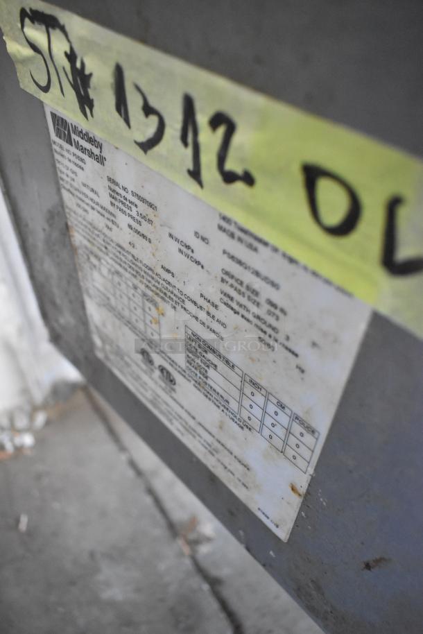 Middleby Marshall PS638G conveyor pizza ovens, natural gas, 89,000 BTU, on commercial casters. Manufacturer label visible.