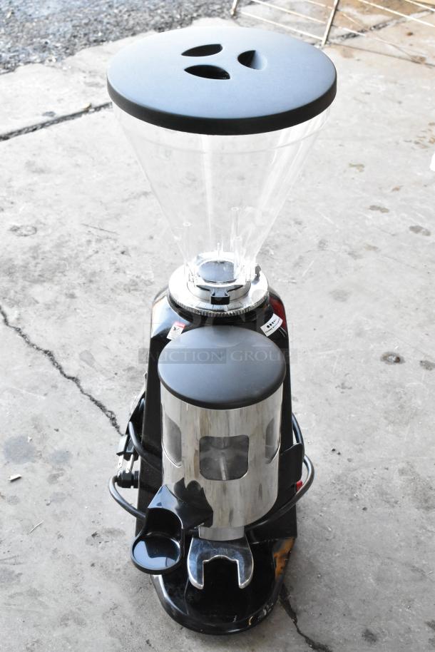 Estella 236ECEG26 commercial countertop espresso machine, in good condition, with clear hopper and grinder. 110/120V, 1 phase.